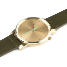 Load image into Gallery viewer, All gold Hervor watch with olive khaki green leather strap and a turquoise accent second hand