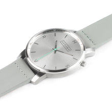 Load image into Gallery viewer, All silver Hervor watch with dove grey leather strap and a turquoise accent second hand