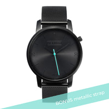 Load image into Gallery viewer, All black Hervor watch with black metallic mesh strap and a turquoise accent second hand
