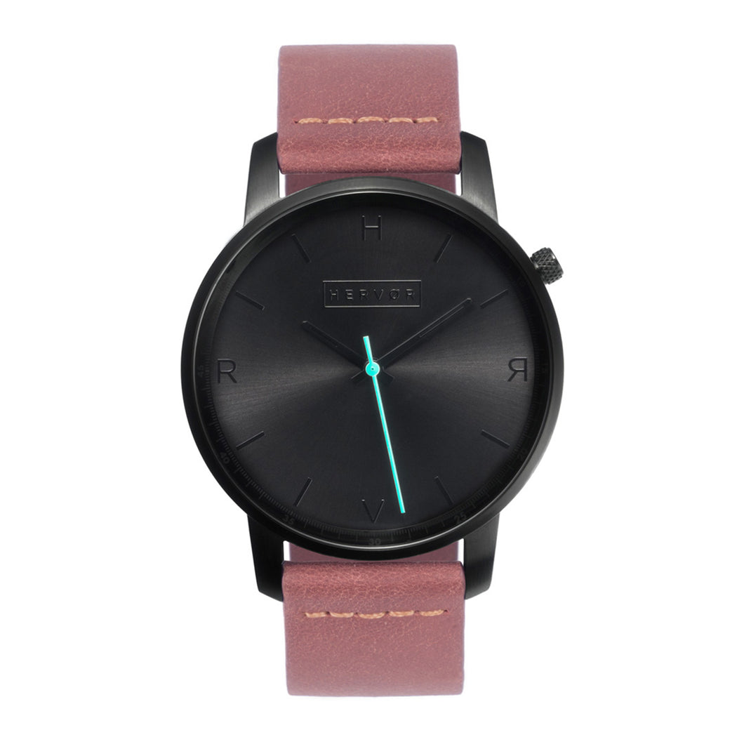All black Hervor watch with dusty rose dark pink leather strap and a turquoise accent second hand