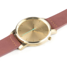 Load image into Gallery viewer, All gold Hervor watch with dusty rose dark pink leather strap and a turquoise accent second hand