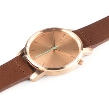 Load image into Gallery viewer, All rose gold Hervor watch with fox brown leather strap and a turquoise accent second hand