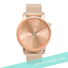 Load image into Gallery viewer, All rose gold Hervor watch with rose gold metallic mesh strap and a turquoise accent second hand