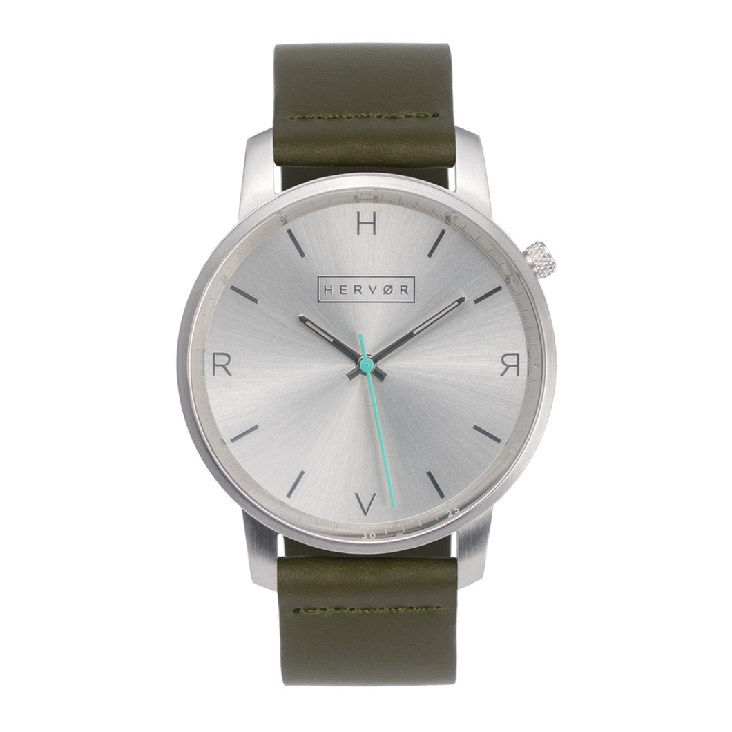 All silver Hervor watch with olive khaki green leather strap and a turquoise accent second hand