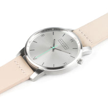 Load image into Gallery viewer, All silver Hervor watch with light pink skin tone leather strap and a turquoise accent second hand